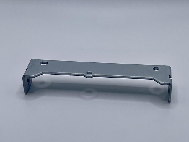 Feed adjusting shaft holder