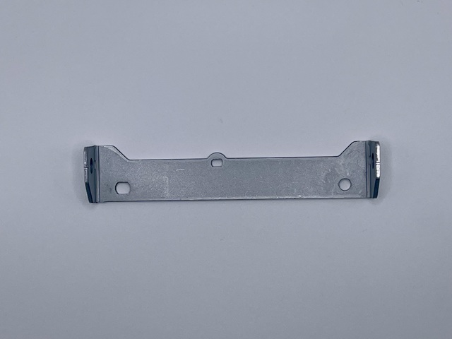 Feed adjusting shaft holder